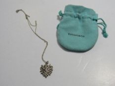 Tiffany & Co olive leaf pendant & necklace. Estimate £40-50.