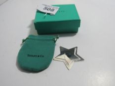 Tiffany & Co star shaped money clip pouch and Tiffany box. Estimate £15-25