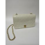 Chanel white leather handbag with certificate of authenticity. Estimate £1,500-1,700.