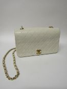 Chanel white leather handbag with certificate of authenticity. Estimate £1,500-1,700.