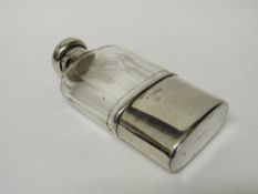 Mappin & Webb silver hip flask, hallmarked lid, London 1911. Estimate £90-110.