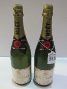 2 bottles of vintage 1980's Moet & Chandon Premiere Cuvee, White label. Estimate £30-40.