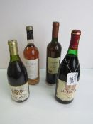 Small group of assorted regional wines. Estimate £5-10.