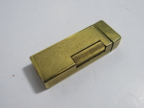 Dunhill gold plated lift arm lighter. Estimate £45-60