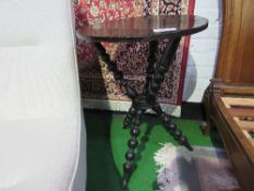 19th century bobbin turned Gypsy table. Estimate £10-20.