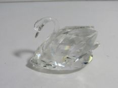 Swarovski Crystal swan, in original box with literature. Estimate £15-20.