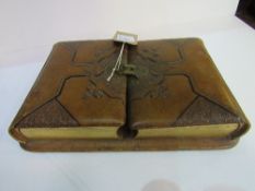 Victorian leather bound double photograph album with double clasp, mounted on stand. Stand - 38cms