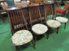 4 high rail back Ercol chairs. Estimate £60-80.