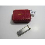 Cartier Lighter with silver and gold decoration including Cartier box. Estimate £50-70