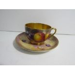 Large Royal Worcester tea cup and saucer decorated with painted fruit, signed by Lewis