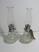 Pair of glass oil lamps