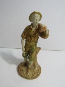 Royal Worcester figurine of a woodman standing by a tree stump holding an axe and a log, measures