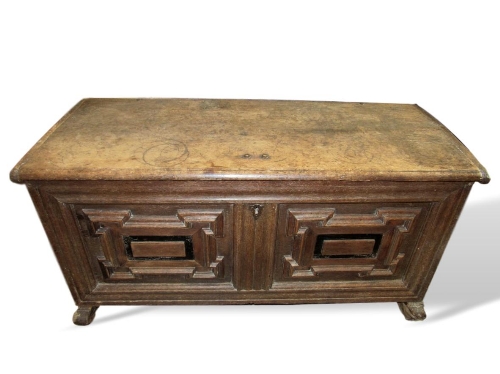 A 17th century oak chest with iron carry handles, geometric applied moulding & original lock, 137cms