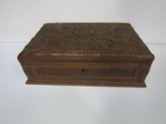 Indian carved Sandalwood jewellery box with lift-out tray & key, 31cms x 9cms x 20cms. Estimate £