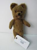 1950's mohair bear with squeeze tummy & moving mouth. Estimate £20-30.