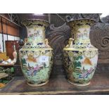 Matched pair of very large Chinese enamelled scenic vases, 47cms tall. Estimate £40-60.