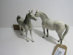 A Beswick grey horse & another marked John Beswick. Estimate £20-40.