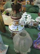 Edwardian ceramic oil lamp with frilled glass shade, converted to electricity. Estimate £10-20.