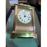 Hinds carriage clock, boxed, new. Estimate £50-70.