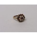 9ct gold garnet & seed pearl cocktail ring, wt 4.2gms, size O. Estimate £45-65.