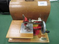 Vintage Grain junior/child hand sewing machine. Estimate £30-40.