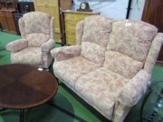 2 seat sofa with matching armchair. Estimate £30-40.