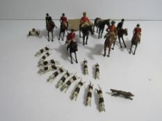 Qty of Britains Ltd metal hunting figurines. Estimate £30-50.