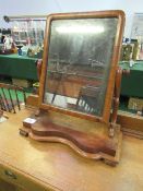 Mahogany framed toilet mirror on stand. Estimate £10-15.