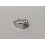 18ct white gold & diamond ring, wt 6.7gms, size O. Estimate £140-180.