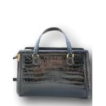 1960's Hermes Pullman crocodile handbag with original clochette, keys & dustbag. Estimate £1,500-1,