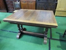 Oak extending dining table on stretcher base, 114cms x 77cms x 91cms. Estimate £10-20.