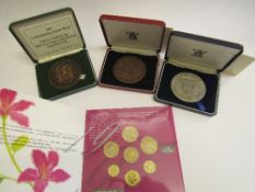 5 Royal Mint various coins/medals with certificates. Estimate £120-150.