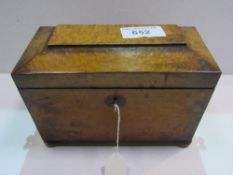 Georgian burr yew wood sarcophagus twin section tea caddy with lock & key. Estimate £40-60.