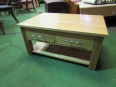 Light oak coffee table with 2 frieze drawers & shelf, 90cms x 61cms x 43cms. Estimate £30-40.