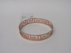 9ct rose gold bangle pierced with Greek key design. Hallmarked Chester in 1921 made by Henry