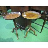 2 hardwood wine tables with pie-crust edge. 59cms high. Estimate £10-20.