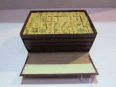 1930's Chinese Mah Jong set in faux red Morocco case, complete set with instructions bamboo tiles,