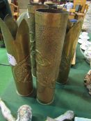 4 brass trench art vases. Estimate £30-50.