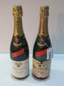 2 bottles of vintage 1980's Kriter Estra Leger Vin Mousseux, Gold Top. Estimate £20-30.