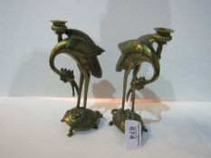 Pair of large Japanese bronze candlesticks modelled as storks, standing on turtles. Estimate £100-