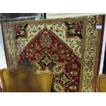 Red ground Heriz carpet size 2.30 x 1.60. Estimate £70-90.