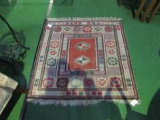 Small square patterned rug, 104cms x 104cms