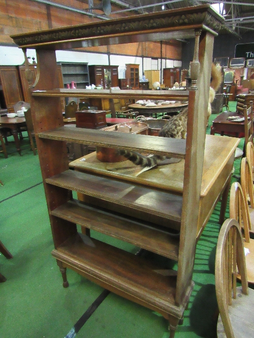 Mahogany open bookcase on legs, 89cms x 26cms x 165cms. Estimate £30-50.