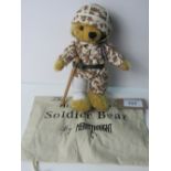 Merrythought soldier bear. Estimate £50-60.