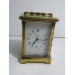 French brass carriage clock, gwo. Estimate £25-30.