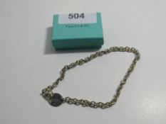 Hallmarked Tiffany & Co heavy sterling silver 'Return to' necklace, wt 54gms. Estimate £60-70.