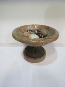 Marble bowl on metal stand c/w 6 marble & onyx 'eggs'. Estimate £20-30.