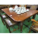 Mahogany dining table on 8 reeded tapered legs & casters, 176cms x 135cms x 72cms. Estimate £50-80.