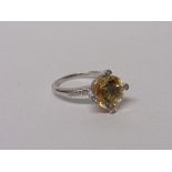 18ct white gold, citrine & diamond ring, wt 5.6gms, size O. Estimate £300-350.