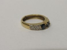 18ct sapphire and diamond ring (opens up from front) size T wt 6.4g. Estimate £450-550